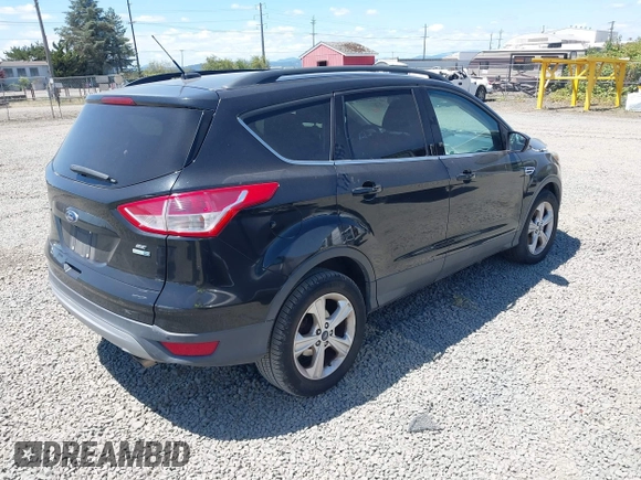 2014 Ford Escape SE with VIN 1FMCU9GX7EUB53012, listed as a IAAI auction lot 42639014 with Not provided miles and . Bid and sale history available at DreamBid. Image 4.
