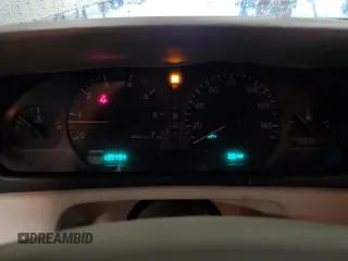 1999 Cadillac Eldorado z VIN 1G6EL12Y1XU611974, wystawiony jako Copart lot #71761494 z przebiegiem 139 494 mil mil oraz Czysty tytuł • Clean title. Historia ofert i sprzedaży dostępna na DreamBid. Obrazek 9.
