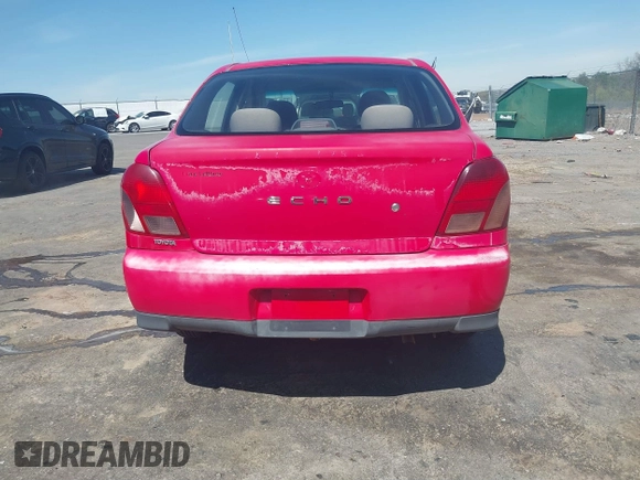 2000 Toyota ECHO z VIN JTDBT1235Y0024870, wystawiony jako IAAI lot #41813772 z przebiegiem 193 215 mil mil oraz . Historia ofert i sprzedaży dostępna na DreamBid. Obrazek 16.