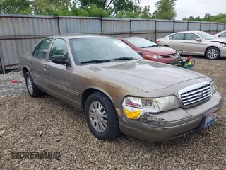 2004 Ford Crown Victoria LX z VIN 2FAFP74W74X114961, wystawiony jako IAAI lot #42347867 z przebiegiem 170 867 mil mil oraz . Historia ofert i sprzedaży dostępna na DreamBid. Obrazek 1.