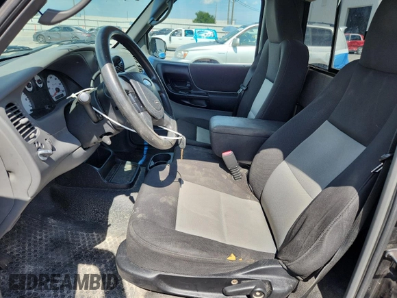 2004 Ford Ranger XL with VIN 1FTYR10U24TA20272, listed as a Copart auction lot 63594485 with 187,837 mi miles and Salvage title. Bid and sale history available at DreamBid. Image 7.