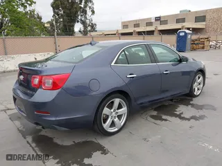 2014 Chevrolet Malibu LTZ with VIN 1G11J5SXXEF214080, listed as a IAAI auction lot 42046009 with 168,343 mi miles. Bid and sale history available at carsss.com. Image 4.