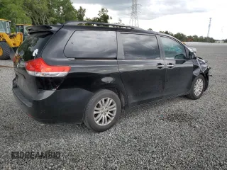 2012 Toyota Sienna XLE AAS with VIN 5TDYK3DC1CS279236, listed as a Copart auction lot 63329165 with 143,937 mi miles and Salvage title. Bid and sale history available at DreamBid. Image 3.
