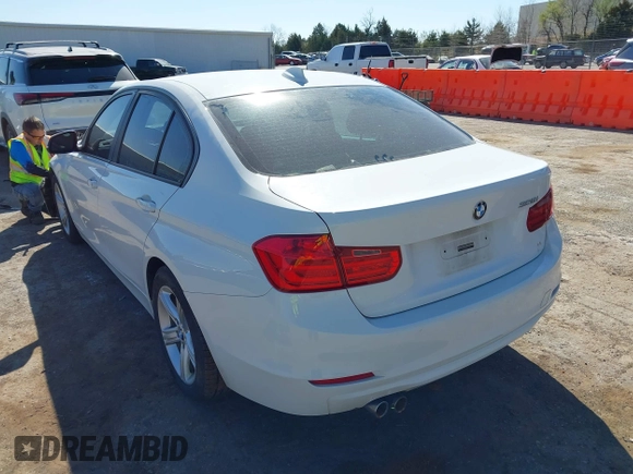 2013 BMW 3 Series 328i with VIN WBA3A5G52DNP18714, listed as a IAAI auction lot 41844082 with 104,867 mi miles and . Bid and sale history available at DreamBid. Image 3.