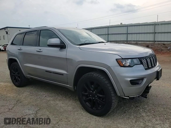 2017 Jeep Grand Cherokee Altitude with VIN 1C4RJFAG9HC772705, listed as a Copart auction lot 61562925 with 184,004 mi miles and Salvage title. Bid and sale history available at DreamBid. Image 14.