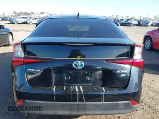 2021 Toyota Prius L Eco z VIN JTDKAMFU1M3134107, wystawiony jako IAAI lot #41763080 z przebiegiem 185 248 mil mil oraz . Historia ofert i sprzedaży dostępna na DreamBid. Obrazek 17.
