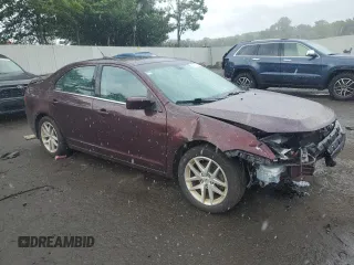 2012 Ford Fusion SEL with VIN 3FAHP0JG1CR358874, listed as a Copart auction lot 86041954 with 59,964 mi miles and Salvage Title. Bid and sale history available at DreamBid. Image 4.