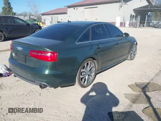 2012 Audi A6 3.0T Prestige with VIN WAUHGAFC8CN160010, listed as a IAAI auction lot 41794692 with 117,897 mi miles. Bid and sale history available at carsss.com. Image 4.