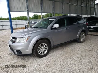 2017 Dodge Journey SXT z VIN 3C4PDDBG4HT578315, wystawiony jako Copart lot #57402405 z przebiegiem 136 404 mil mil oraz Czysty tytuł • Clean title. Historia ofert i sprzedaży dostępna na DreamBid. Obrazek 1.