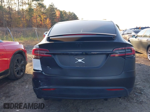 2020 Tesla Model X Long Range with VIN 5YJXCDE28LF298553, listed as a IAAI auction lot 40863184 with 54,031 mi miles and . Bid and sale history available at DreamBid. Image 16.