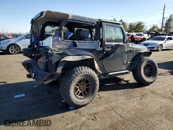2009 Jeep Wrangler Rubicon with VIN 1J4GA64169L765933, listed as a Copart auction lot 84963104 with 107,190 mi miles and Salvage Title. Bid and sale history available at DreamBid. Image 3.