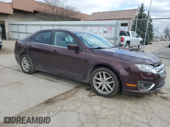 2012 Ford Fusion SEL with VIN 3FAHP0JA6CR376167, listed as a Copart auction lot 53024435 with 159,329 mi miles and Salvage Title. Bid and sale history available at DreamBid. Image 4.