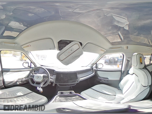 2024 Rivian R1S Adventure z VIN 7PDSGABA1RN030813, wystawiony jako Copart lot #47614385 z przebiegiem 16 946 mil mil oraz Szkody całkowita. Historia ofert i sprzedaży dostępna na DreamBid. Obrazek 14.