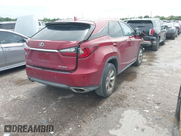 2016 Lexus RX 350 with VIN 2T2ZZMCA5GC010091, listed as a IAAI auction lot 42465790 with 146,933 mi miles and . Bid and sale history available at DreamBid. Image 4.