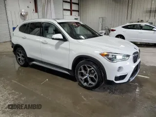 2018 BMW X1 xDrive28i z VIN WBXHT3C31J3H33391, wystawiony jako Copart lot #47849675 z przebiegiem 73 108 mil mil oraz Szkody całkowita. Historia ofert i sprzedaży dostępna na DreamBid. Obrazek 4.