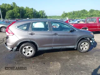2013 Honda CR-V LX with VIN 3CZRM3H31DG703436, listed as a IAAI auction lot 42702584 with 140,013 mi miles and . Bid and sale history available at DreamBid. Image 14.