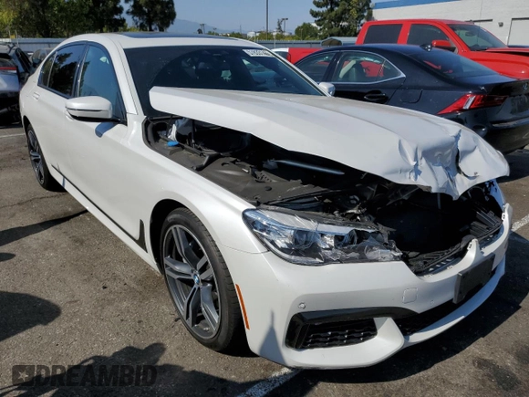 2018 BMW 7 Series 740i with VIN WBA7E2C5XJB214886, listed as a Copart auction lot 57833143 with 39,975 mi miles. Bid and sale history available at carsss.com. Image 4.