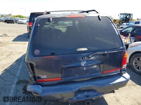 1999 Mercury Mountaineer z VIN 4M2ZU55P9XUJ24487, wystawiony jako Copart lot #54600964 z przebiegiem 139 771 mil mil oraz Nie do naprawy • Non repairable. Historia ofert i sprzedaży dostępna na DreamBid. Obrazek 6.