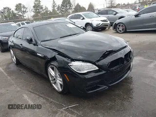 2016 BMW 6 Series 650i z VIN WBA6D4C56GD977589, wystawiony jako IAAI lot #41839229 z przebiegiem 83 044 mil mil oraz . Historia ofert i sprzedaży dostępna na DreamBid. Obrazek 1.