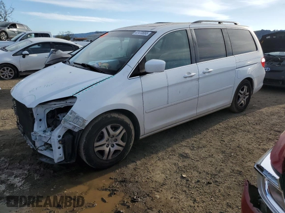 2005 Honda Odyssey EX-L with VIN 5FNRL38695B406179, listed as a Copart auction lot 47470555 with 133,448 mi miles and Salvage Title. Bid and sale history available at carsss.com. Image 1.