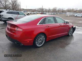 2014 Lincoln MKZ z VIN 3LN6L2J9XER806263, wystawiony jako IAAI lot #41794501 z przebiegiem 96 845 mil mil oraz . Historia ofert i sprzedaży dostępna na DreamBid. Obrazek 4.