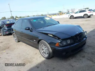 2003 BMW M5 z VIN WBSDE93463CF93416, wystawiony jako IAAI lot #41858283 z przebiegiem 98 853 mil mil oraz . Historia ofert i sprzedaży dostępna na DreamBid. Obrazek 1.