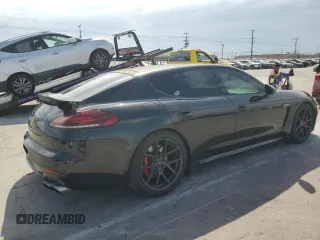 2014 Porsche Panamera Turbo z VIN WP0AC2A72EL073234, wystawiony jako Copart lot #65813464 z przebiegiem 83 918 mil mil oraz Szkoda całkowita • Salvage title. Historia ofert i sprzedaży dostępna na DreamBid. Obrazek 3.