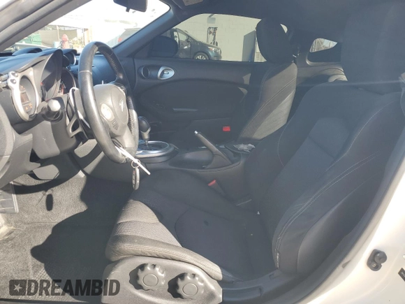 2014 Nissan 370Z Nismo with VIN JN1AZ4EH0EM635111, listed as a Copart auction lot 87292134 with 185,356 mi miles and Salvage Title. Bid and sale history available at DreamBid. Image 7.