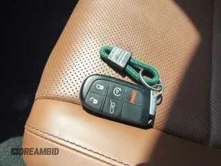 2019 Jeep Grand Cherokee Summit with VIN 1C4RJFJT1KC785744, listed as a IAAI auction lot 42645006 with 38,483 mi miles and . Bid and sale history available at DreamBid. Image 11.