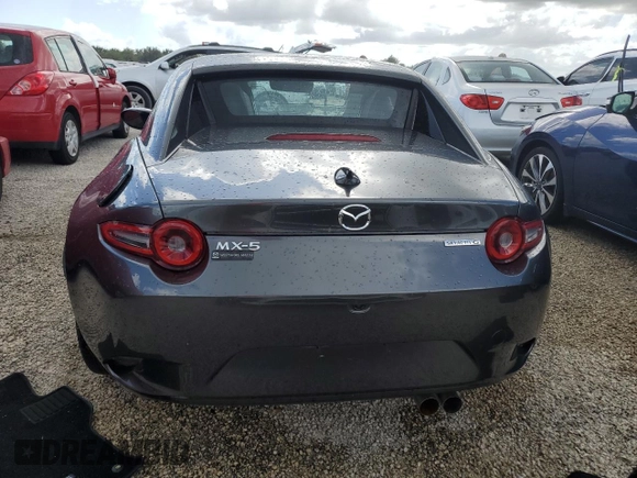 2024 Mazda MX-5 Miata Grand Touring z VIN JM1NDAM73R0603254, wystawiony jako Copart lot #74551704 z przebiegiem Nie podano mil oraz Nie do naprawy • Non repairable. Historia ofert i sprzedaży dostępna na DreamBid. Obrazek 6.