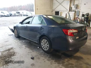 2014 Toyota Camry L with VIN 4T4BF1FK4ER379544, listed as a IAAI auction lot 41837701 with 114,136 mi miles. Bid and sale history available at carsss.com. Image 3.