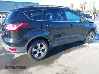 2013 Ford Escape SE with VIN 1FMCU9G98DUD88521, listed as a IAAI auction lot 41496428 with 163,321 mi miles and . Bid and sale history available at DreamBid. Image 4.