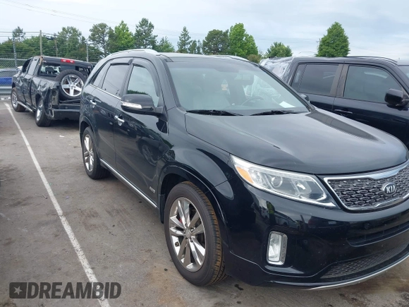 2014 Kia Sorento SX z VIN 5XYKWDA7XEG485405, wystawiony jako IAAI lot #42312938 z przebiegiem 169 728 mil mil oraz . Historia ofert i sprzedaży dostępna na DreamBid. Obrazek 1.