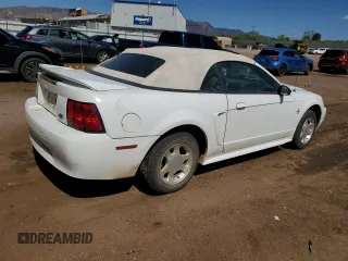 2000 Ford Mustang z VIN 1FAFP4447YF287507, wystawiony jako Copart lot #57669515 z przebiegiem 133 309 mil mil oraz Czysty tytuł • Clean title. Historia ofert i sprzedaży dostępna na DreamBid. Obrazek 3.