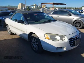 2005 Chrysler Sebring GTC with VIN 1C3EL75R55N613856, listed as a IAAI auction lot 41820747 with Not Provided miles and . Bid and sale history available at DreamBid. Image 1.