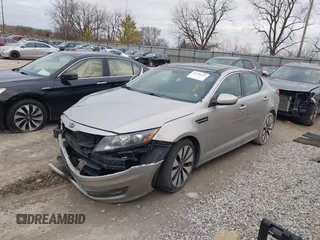 2012 Kia Optima SX with VIN 5XXGR4A62CG027184, listed as a IAAI auction lot 41236626 with 121,686 mi miles and . Bid and sale history available at carsss.com. Image 2.