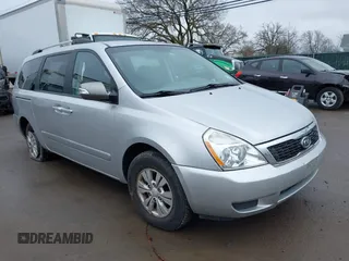 2012 Kia Sedona LX with VIN KNDMG4C72C6485952, listed as a IAAI auction lot 42029147 with 129,296 mi miles. Bid and sale history available at carsss.com. Image 1.