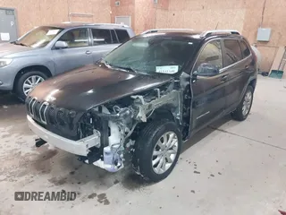 2014 Jeep Cherokee Limited z VIN 1C4PJMDS0EW240958, wystawiony jako IAAI lot #41541340 z przebiegiem 140 625 mil mil oraz . Historia ofert i sprzedaży dostępna na DreamBid. Obrazek 2.