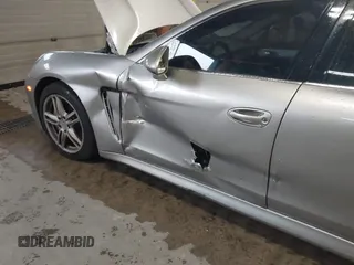2012 Porsche Panamera S z VIN WP0AB2A71CL060068, wystawiony jako IAAI lot #42309742 z przebiegiem 93 334 mil mil oraz . Historia ofert i sprzedaży dostępna na DreamBid. Obrazek 6.