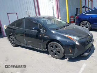 2017 Toyota Prius Two with VIN JTDKBRFU1H3036243, listed as a IAAI auction lot 41991623 with 88,626 mi miles. Bid and sale history available at carsss.com. Image 13.