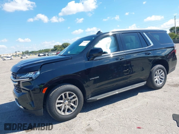 2023 Chevrolet Tahoe LS z VIN 1GNSCMKD9PR282840, wystawiony jako IAAI lot #41904280 z przebiegiem 73 298 mil mil oraz . Historia ofert i sprzedaży dostępna na DreamBid. Obrazek 2.