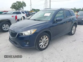 2014 Mazda CX-5 Grand Touring with VIN JM3KE2DY8E0425258, listed as a IAAI auction lot 42179452 with 132,137 mi miles. Bid and sale history available at carsss.com. Image 19.