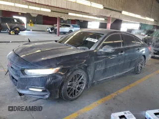 2018 Honda Accord Touring z VIN 1HGCV2F93JA040263, wystawiony jako Copart lot #89186765 z przebiegiem 95 110 mil mil oraz Nie do naprawy • Non repairable. Historia ofert i sprzedaży dostępna na DreamBid. Obrazek 1.