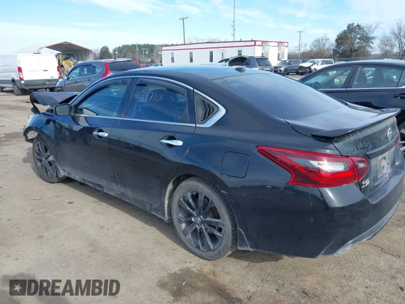 2018 Nissan Altima 2.5 SR with VIN 1N4AL3AP5JC283588, listed as a IAAI auction lot 41397101 with 151,478 mi miles. Bid and sale history available at carsss.com. Image 3.