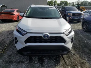 2024 Toyota RAV4 Hybrid XLE Premium with VIN 4T3B6RFV1RU174487, listed as a Copart auction lot 57208645 with 9,911 mi miles and Salvage title. Bid and sale history available at DreamBid. Image 5.