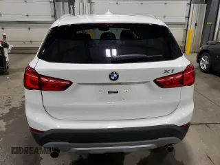 2017 BMW X1 xDrive28i with VIN WBXHT3Z38H4A53824, listed as a Copart auction lot 52500215 with 106,782 mi miles and Salvage title. Bid and sale history available at DreamBid. Image 6.