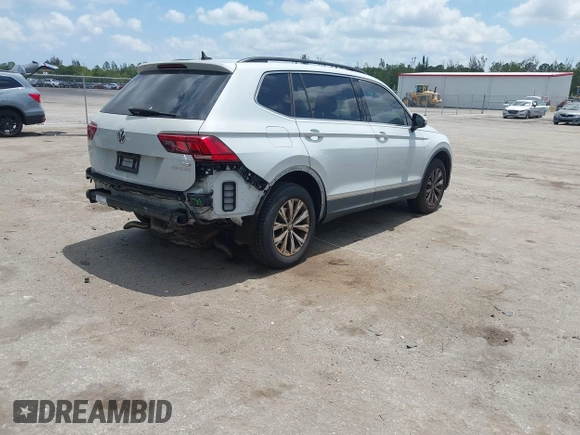 2018 Volkswagen Tiguan SEL with VIN 3VV3B7AX4JM188193, listed as a IAAI auction lot 42107802 with 68,911 mi miles and . Bid and sale history available at DreamBid. Image 4.