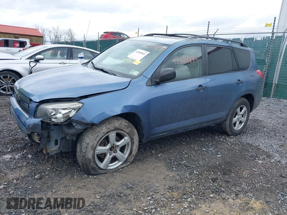 2006 Toyota RAV4 with VIN JTMBK33VX65003043, listed as a IAAI auction lot 42009844 with 294,380 mi miles. Bid and sale history available at carsss.com. Image 2.