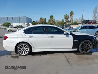 2015 BMW 5 Series 528i with VIN WBA5A5C59FD524043, listed as a IAAI auction lot 42023892 with 94,216 mi miles and . Bid and sale history available at carsss.com. Image 13.