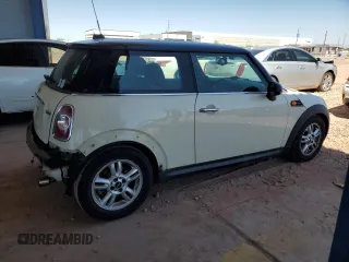 2012 MINI Hardtop z VIN WMWSU3C5XCT542244, wystawiony jako Copart lot #65226525 z przebiegiem 129 512 mil mil oraz Szkoda całkowita • Salvage title. Historia ofert i sprzedaży dostępna na DreamBid. Obrazek 3.